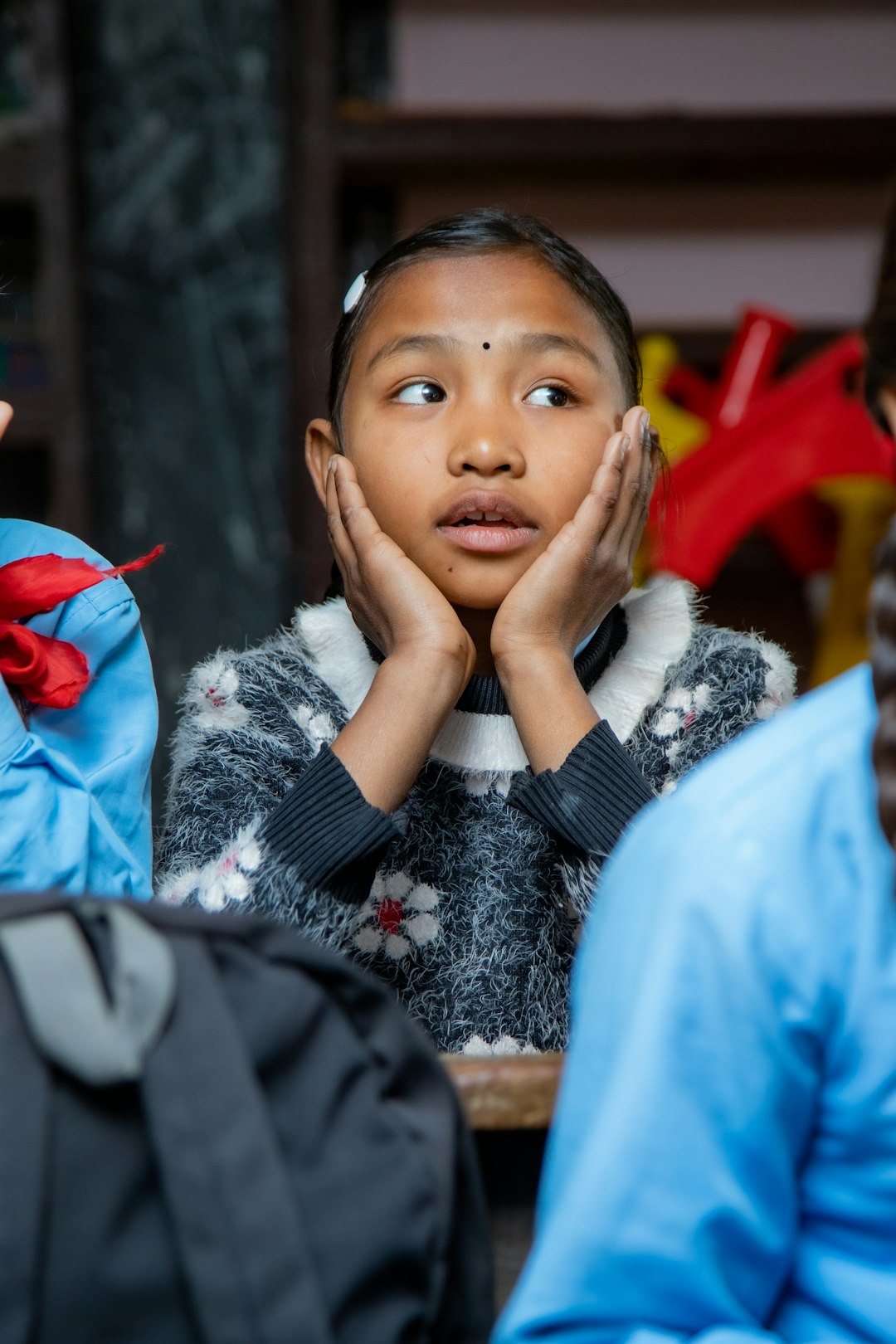 Curious Minds – Young Girl in the Classroom